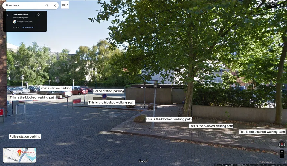Annotated Street View showing the police parking lot and the blocked walking path at Ridderstræde.